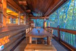 Saddle Lodge - Entry Level Screened Deck Dining Area